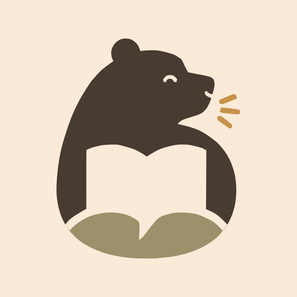 A bear enjoying an open book